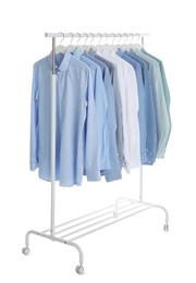 Photo of Wardrobe rack with men clothes on white background