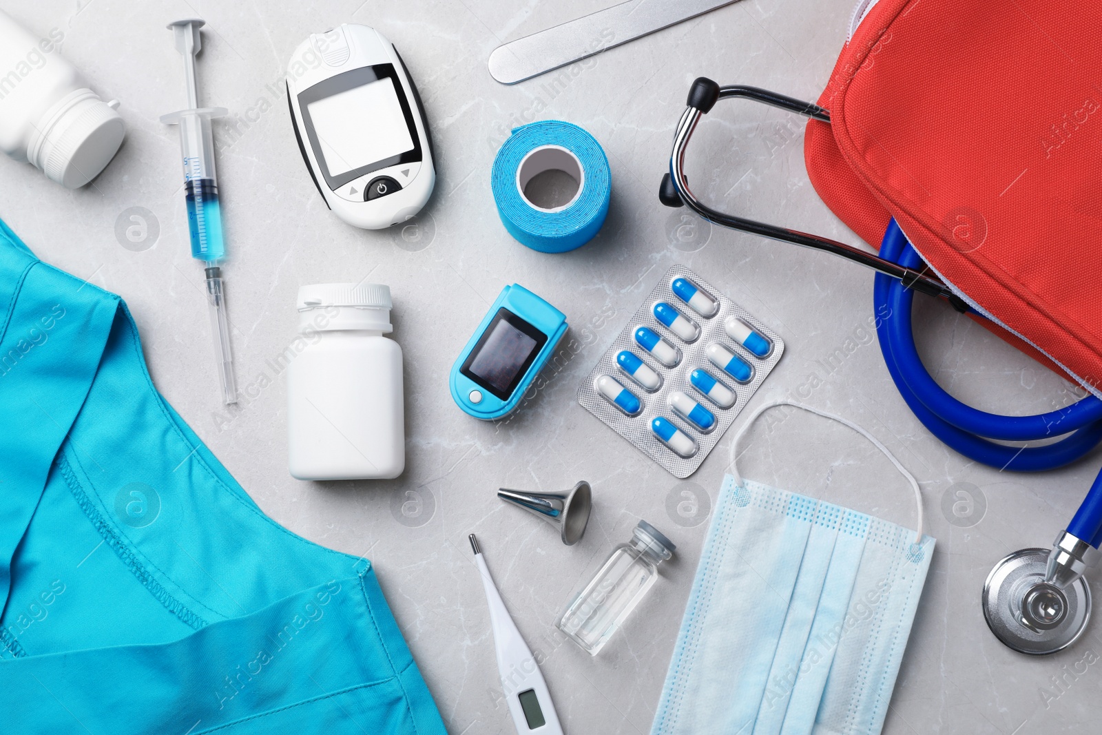 Photo of Flat lay composition with medical objects on grey background