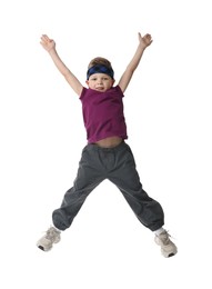 Happy little boy dancing on white background