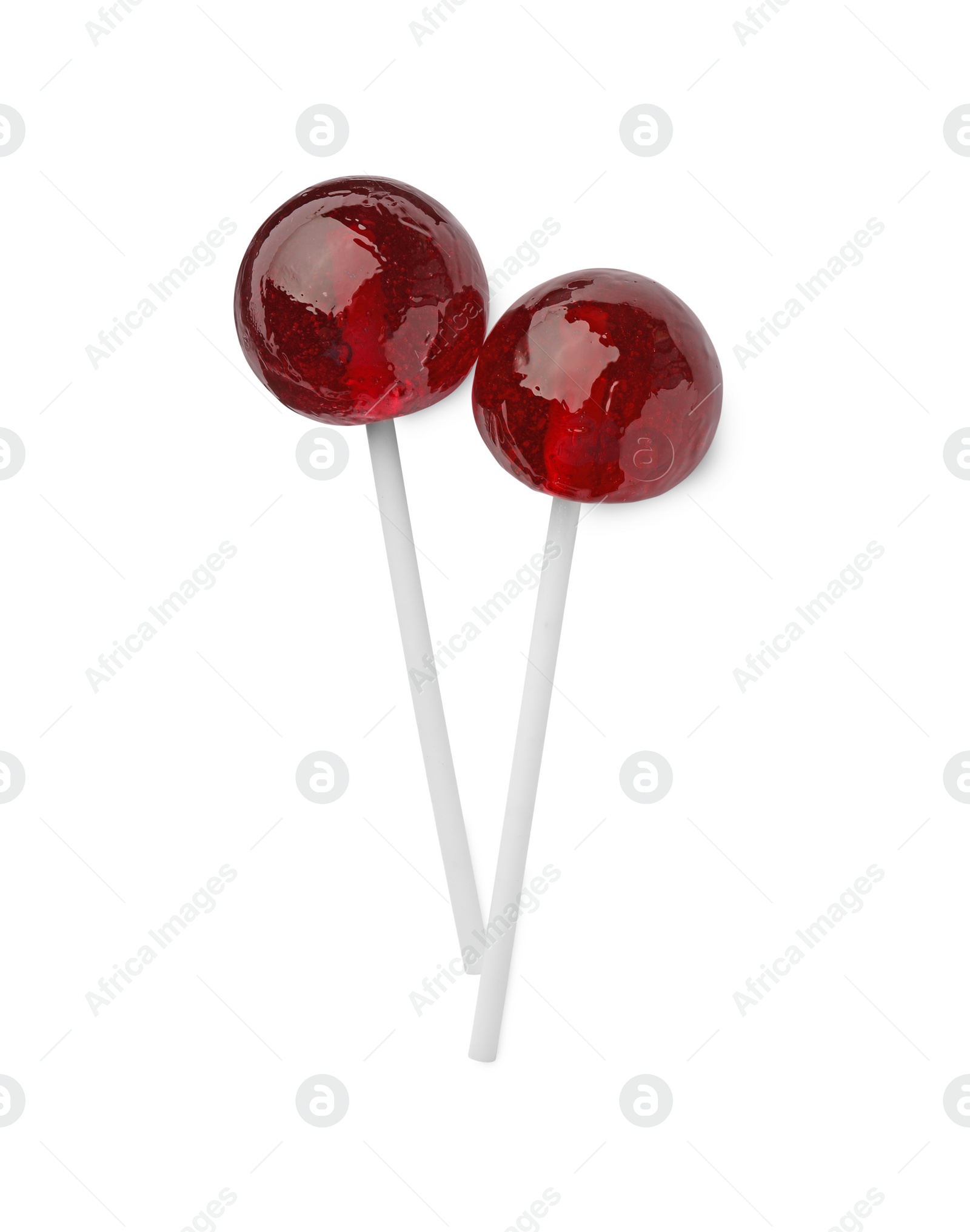 Photo of Two sweet red lollipops isolated on white, top view