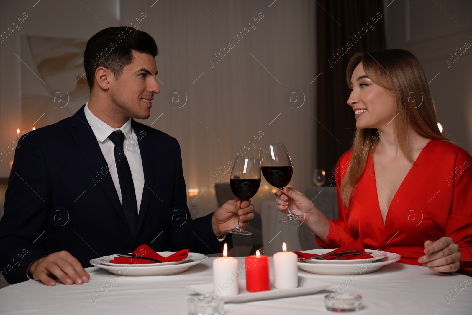 Photo of Lovely couple having romantic dinner in restaurant