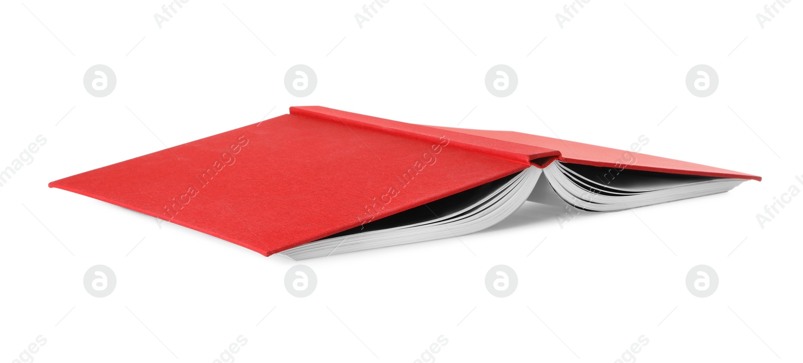 Photo of Open book with red cover on white background