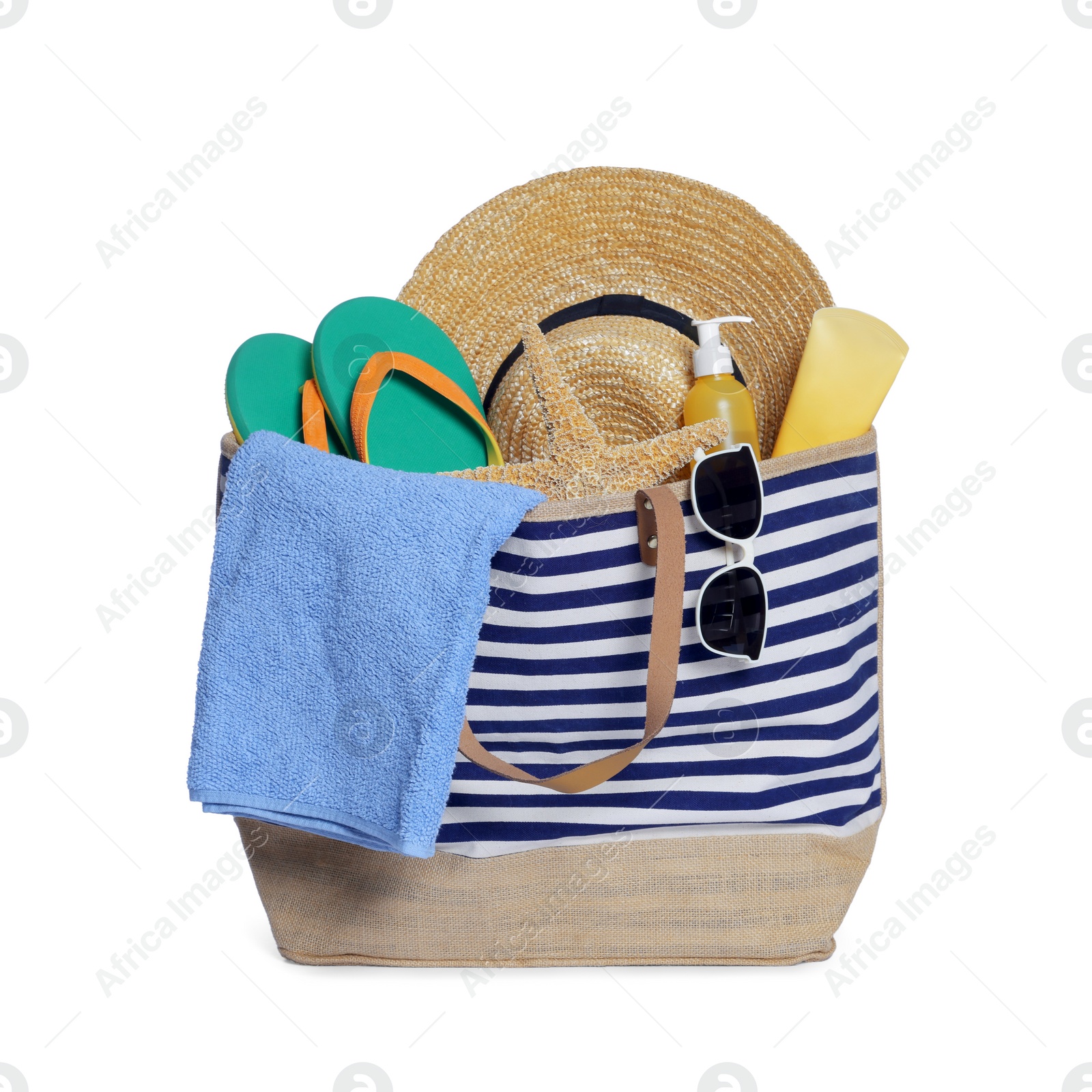 Photo of Stylish bag with skin care products and other beach accessories isolated on white