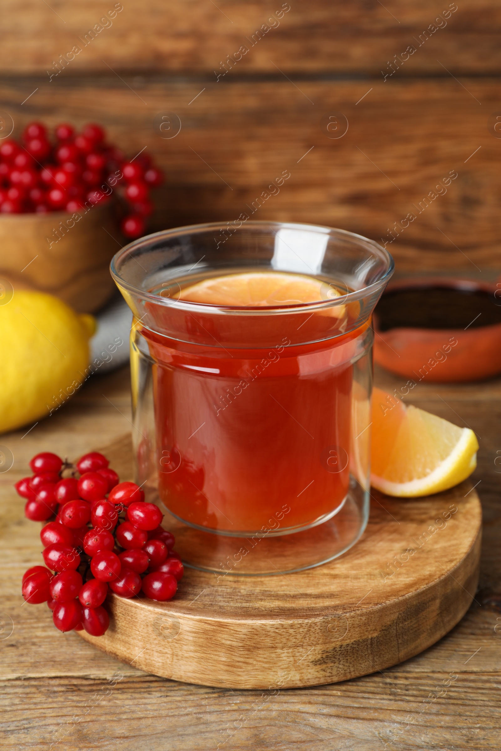 Photo of Immunity boosting drink and ingredients on wooden table