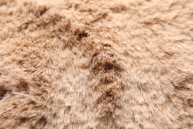 Photo of Texture of brown faux fur as background, closeup