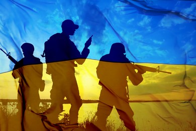 Silhouettes of soldiers and Ukrainian national flag, double exposure