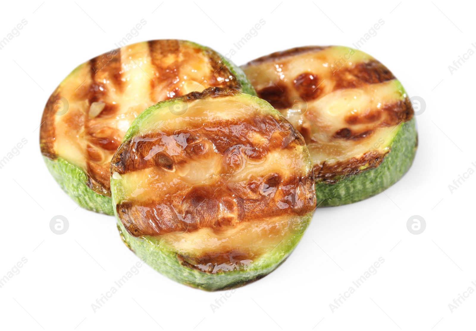 Photo of Slices of delicious grilled zucchini isolated on white