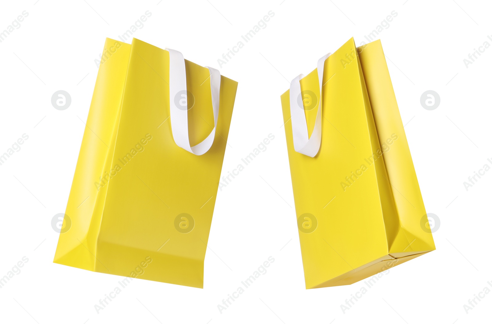 Image of Yellow shopping bag isolated on white, different sides