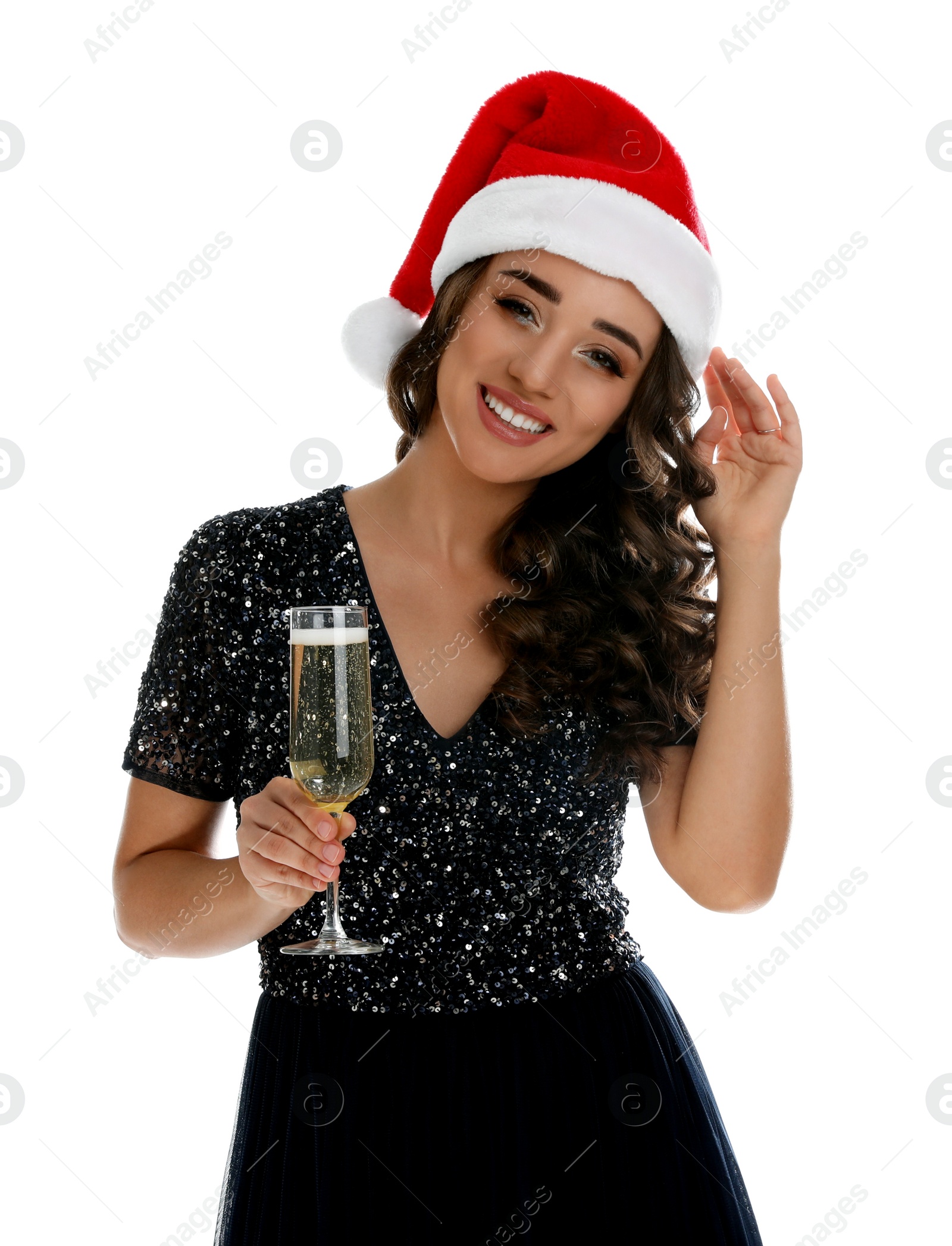 Photo of Beautiful woman in Santa hat holding glass of champagne on white background. Christmas party