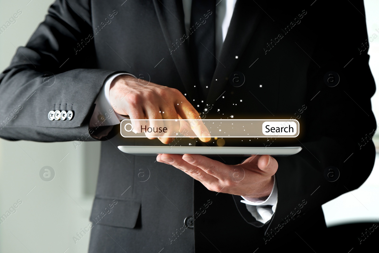 Image of Businessman using tablet to find house, closeup. Search bar over device