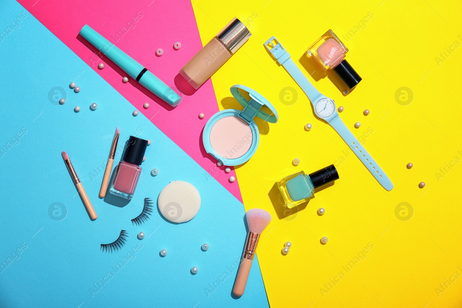 Photo of Flat lay composition with cosmetic products on color background