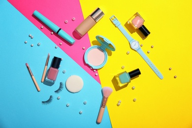 Flat lay composition with cosmetic products on color background