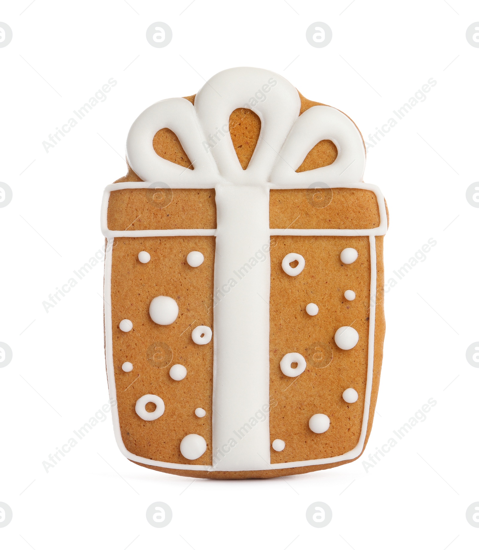 Photo of Tasty gingerbread cookie in shape of gift box on white background. St. Nicholas Day celebration