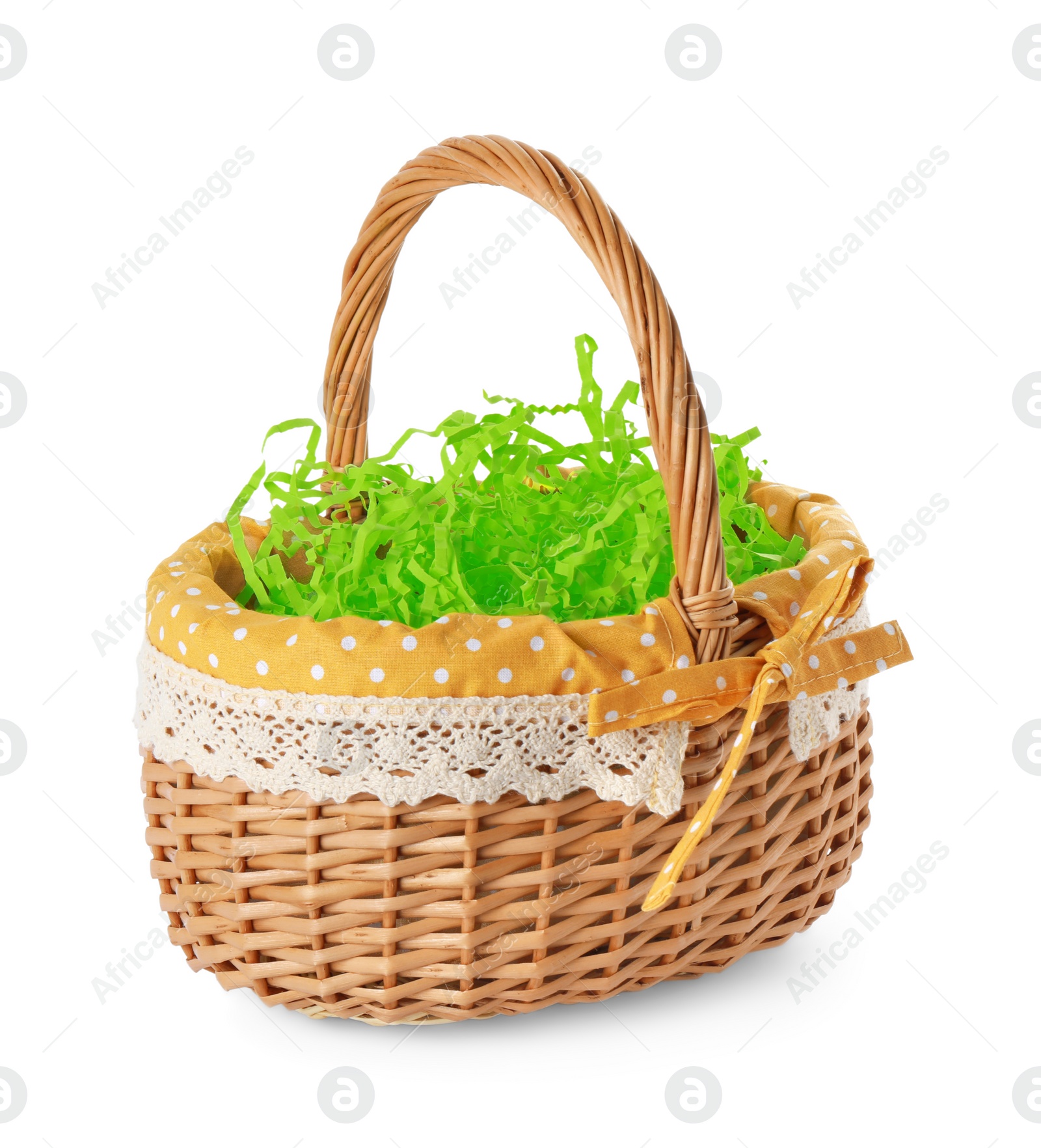 Photo of Easter wicker basket with decorated grass isolated on white