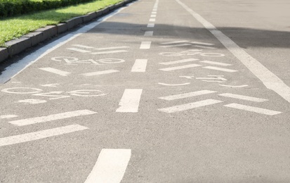 Bicycle lane with marking on asphalt road