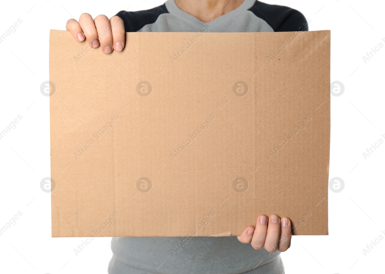 Photo of Woman holding piece of cardboard on white background, closeup. Space for text