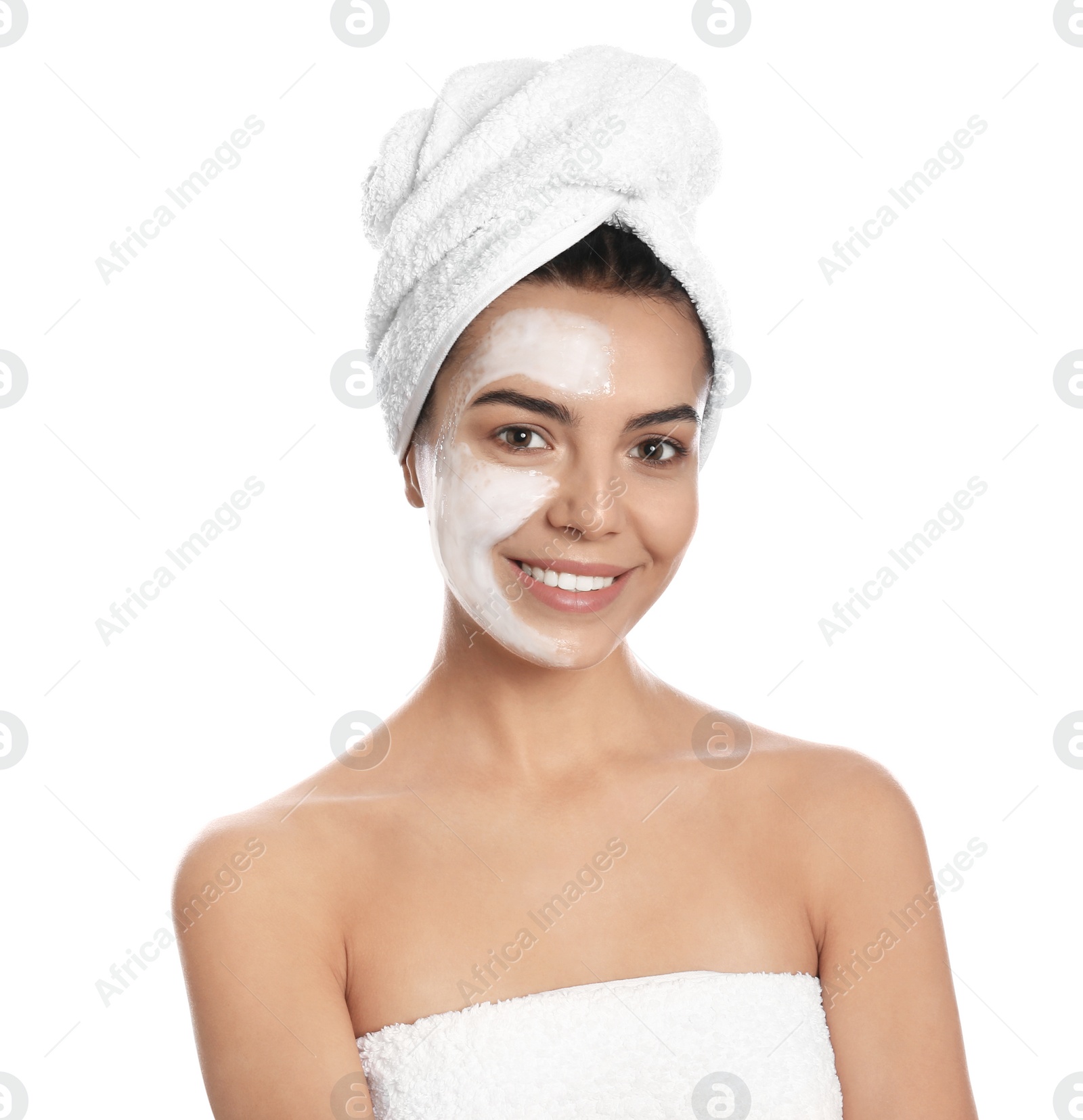 Photo of Happy young woman with organic mask on her face against white background