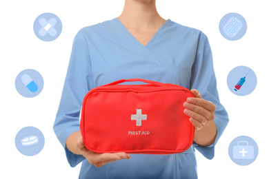 Doctor holding first aid kit on white background, closeup