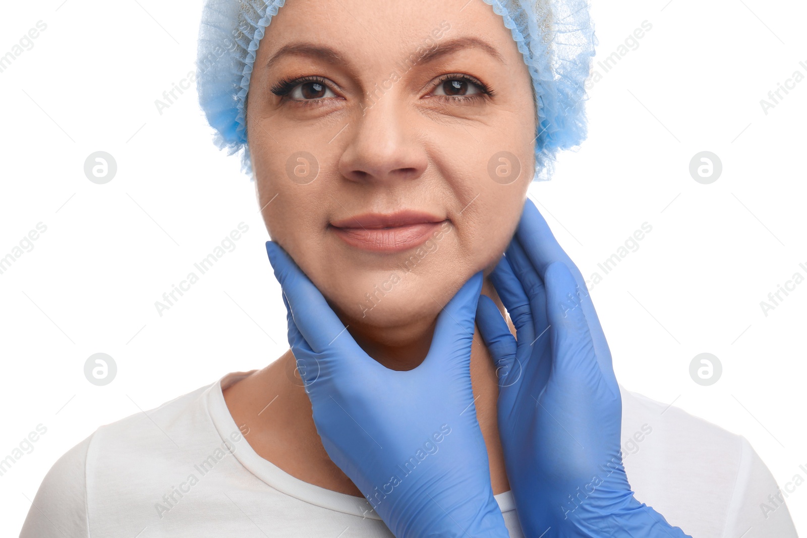 Photo of Doctor examining mature woman on white background. Double chin surgery