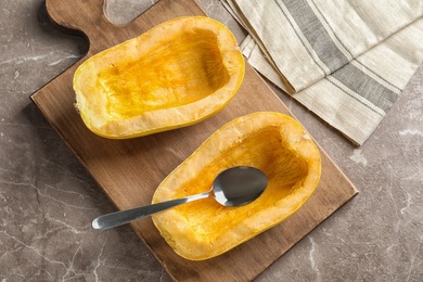 Photo of Flat lay composition with cut spaghetti squash and spoon on gray background