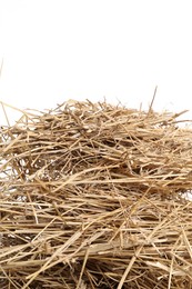 Photo of Dried straw isolated on white. Livestock feed