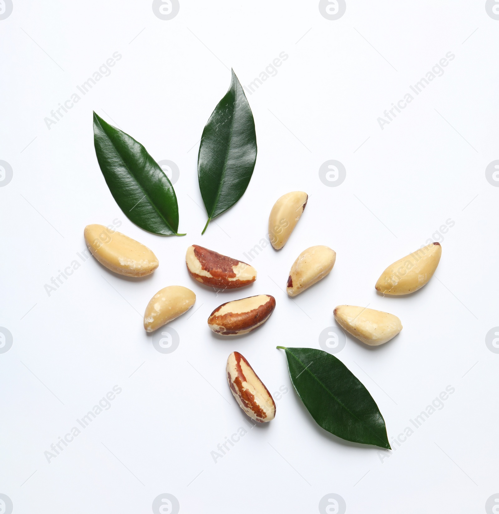 Photo of Composition with Brazil nuts on white background, top view