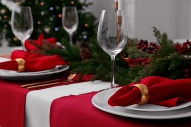 Beautiful table setting with Christmas decor indoors, space for text