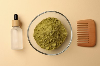 Henna powder, bottle of liquid and comb on beige background, flat lay. Natural hair coloring
