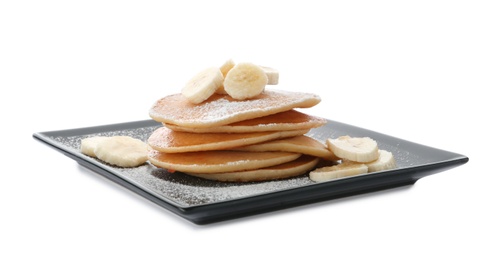 Photo of Plate with delicious pancakes on white background