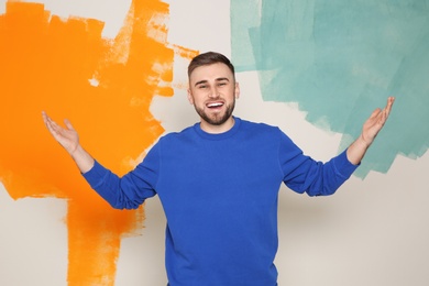 Photo of Portrait of handsome man on color background