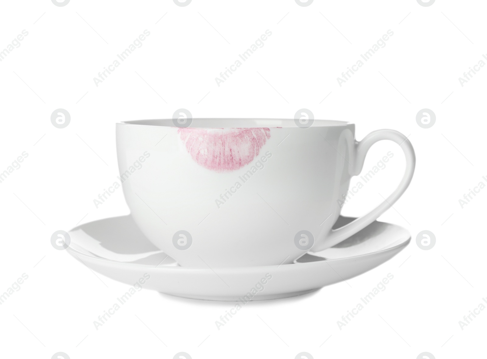 Photo of Ceramic cup with lipstick mark on white background