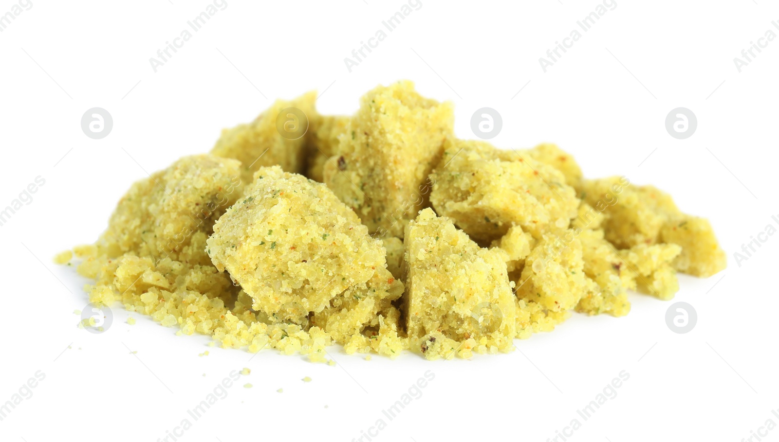 Photo of Aromatic crumbled bouillon cube on white background