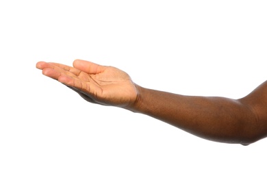 African-American man holding something in hand on white background, closeup