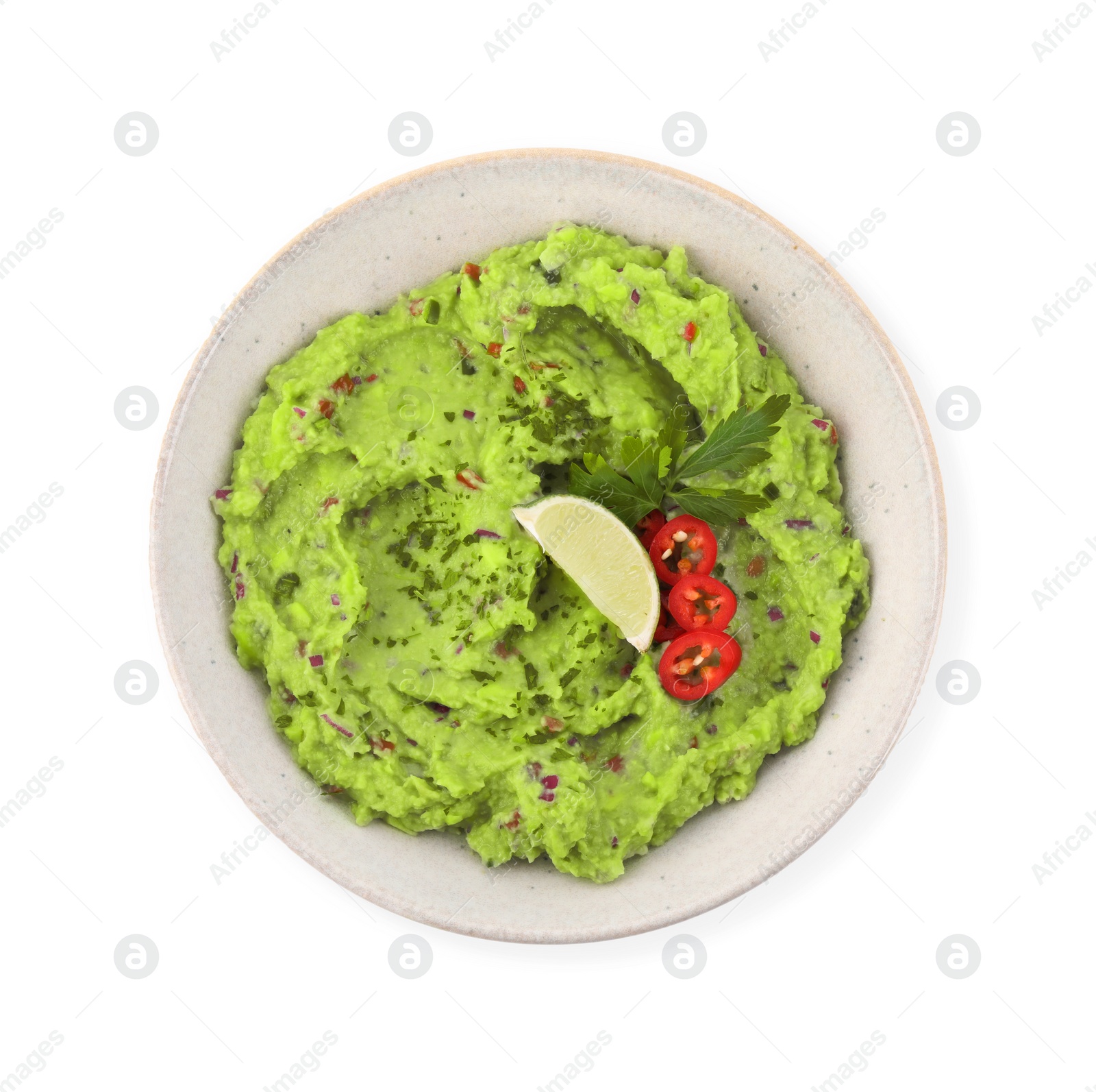 Photo of Delicious guacamole served with lime, pepper and parsley isolated on white, top view