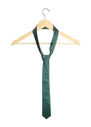 Photo of Hanger with green necktie isolated on white