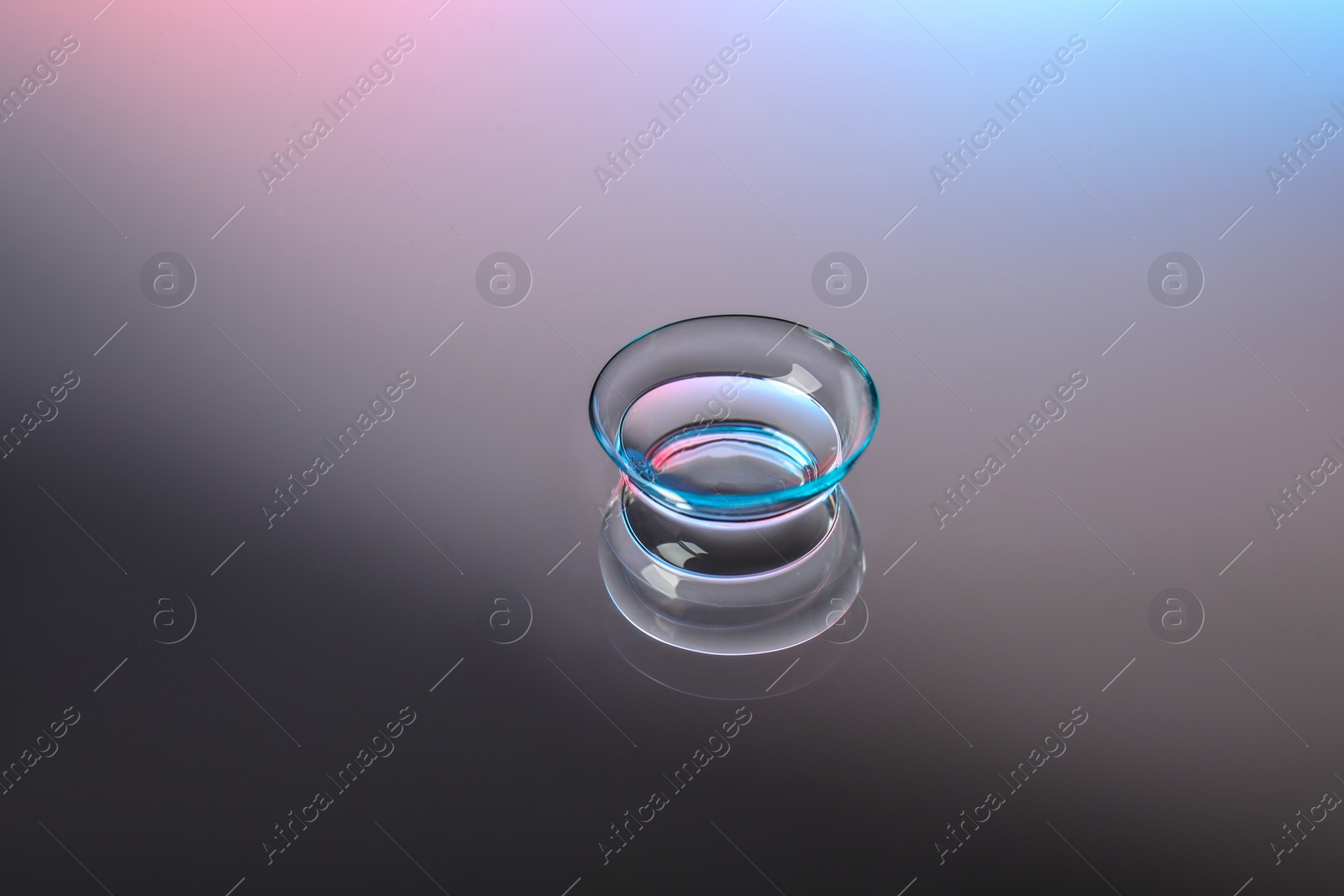 Photo of Contact lens on color background