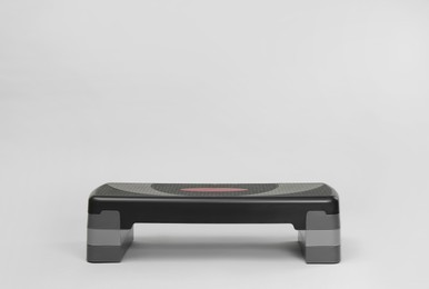 Photo of Step platform on light background, space for text. Sport equipment