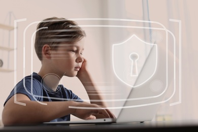 Child safety online. Little boy using laptop at home. Illustration of internet blocking app on foreground