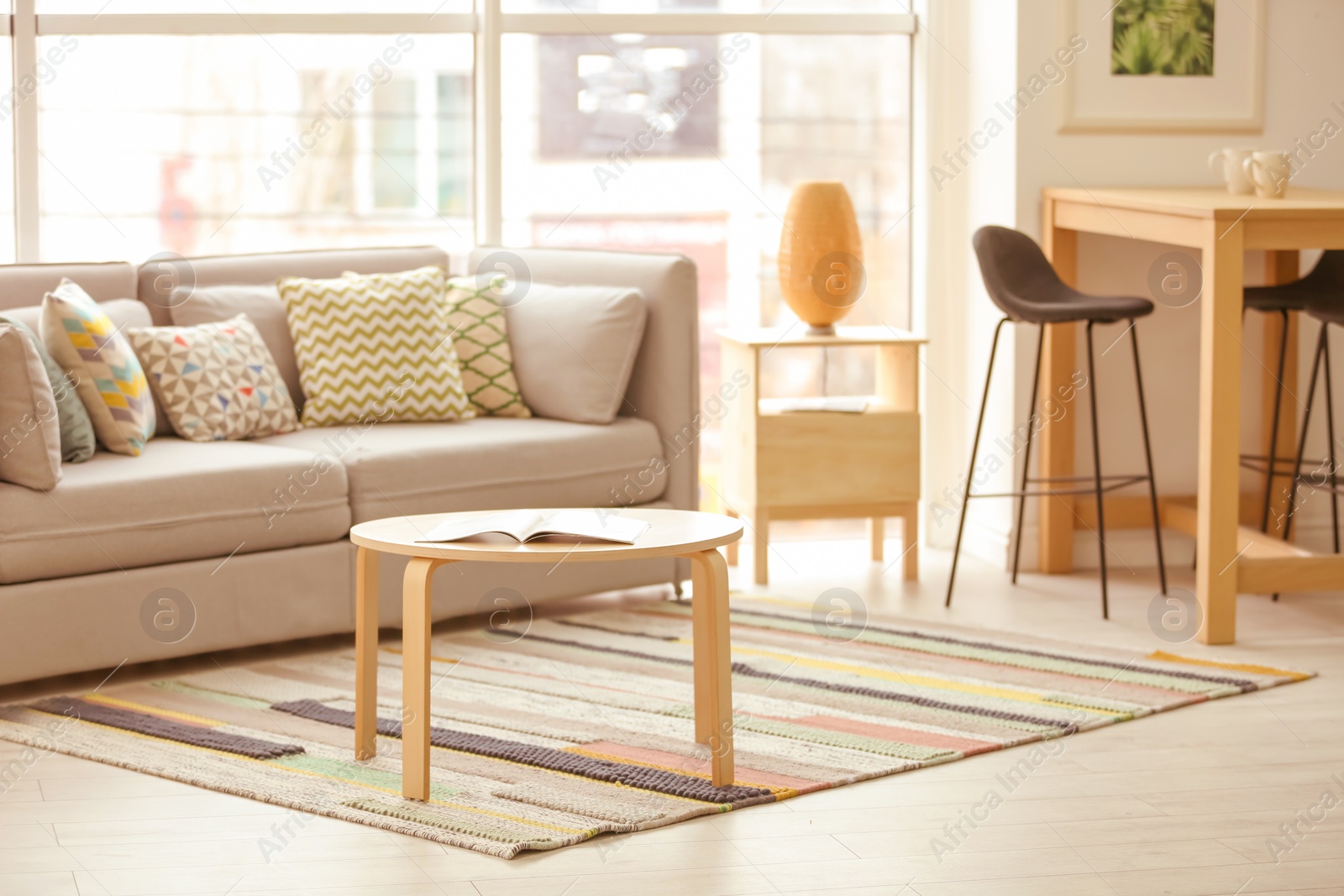 Photo of Stylish living room interior with comfortable sofa