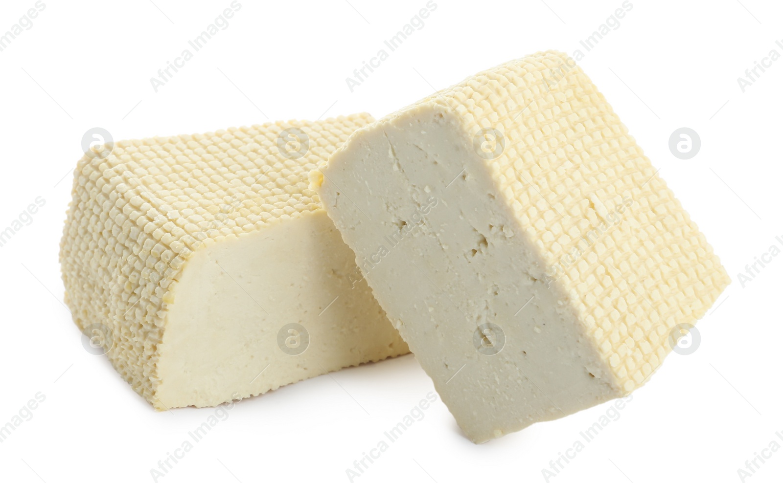 Photo of Pieces of delicious tofu on white background. Soybean curd