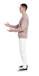 Photo of Full length portrait of handsome young man on white background