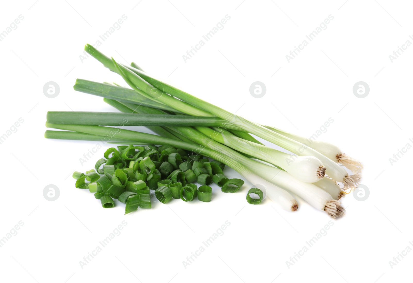 Photo of Cut fresh green onions on white background