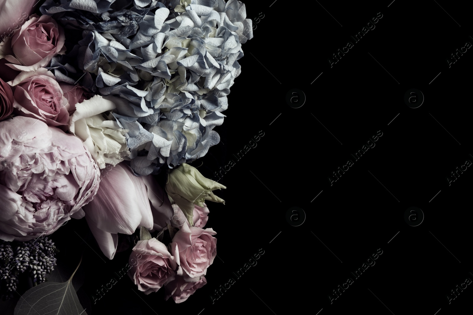 Photo of Beautiful bouquet of different flowers on black background, space for text. Floral card design with dark vintage effect