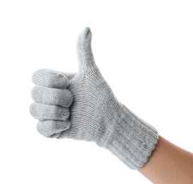 Photo of Woman in grey woolen glove showing thumb up gesture on white background, closeup