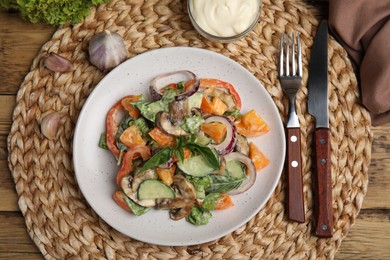 Delicious salad with mayonnaise served on wooden table, flat lay