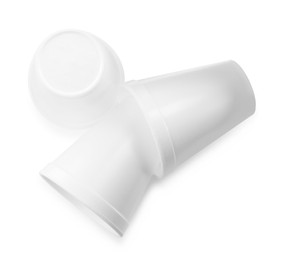 Photo of Styrofoam cups on white background, top view