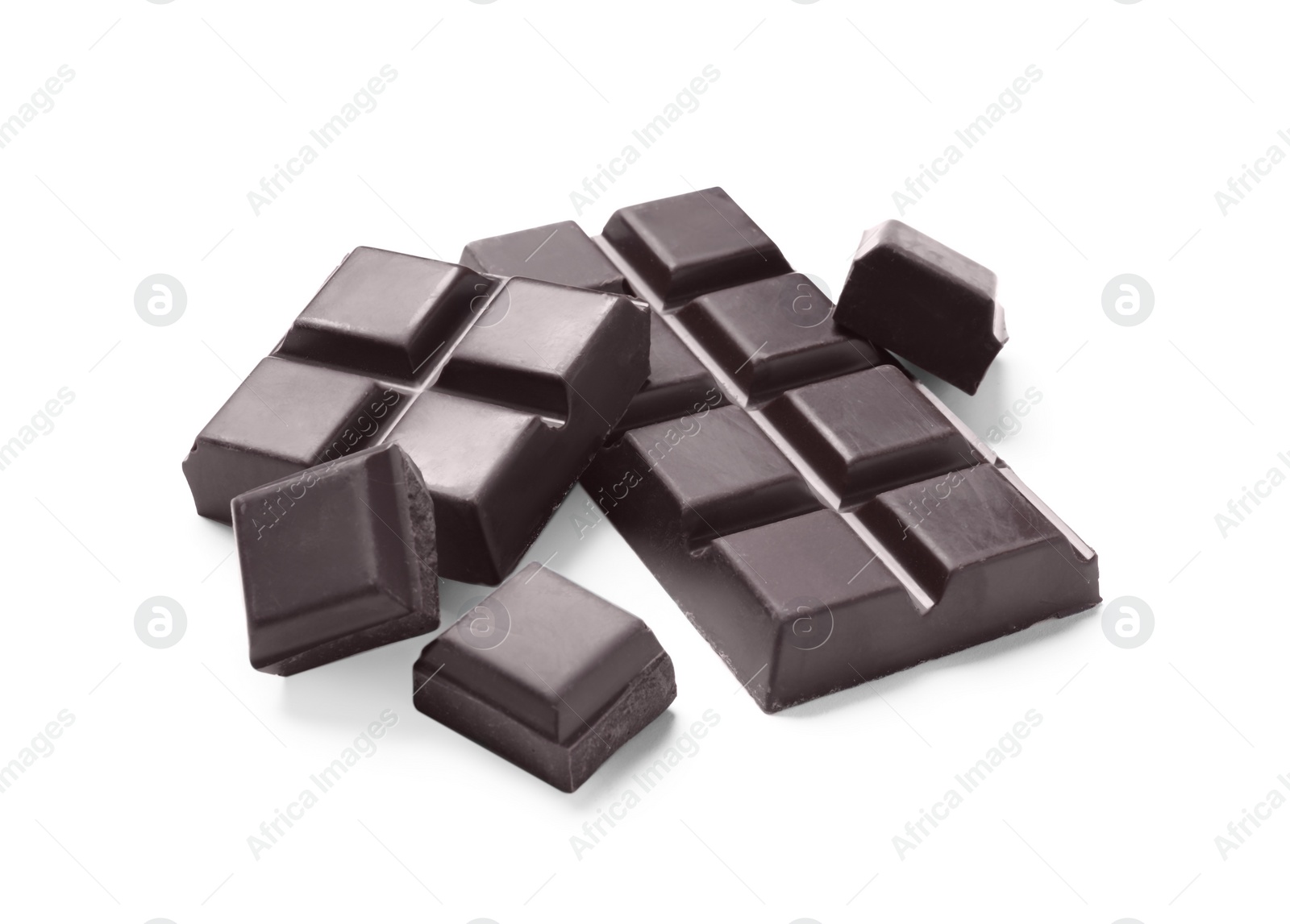 Photo of Pieces of delicious dark chocolate isolated on white