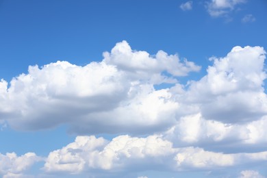 Beautiful white fluffy clouds in blue sky