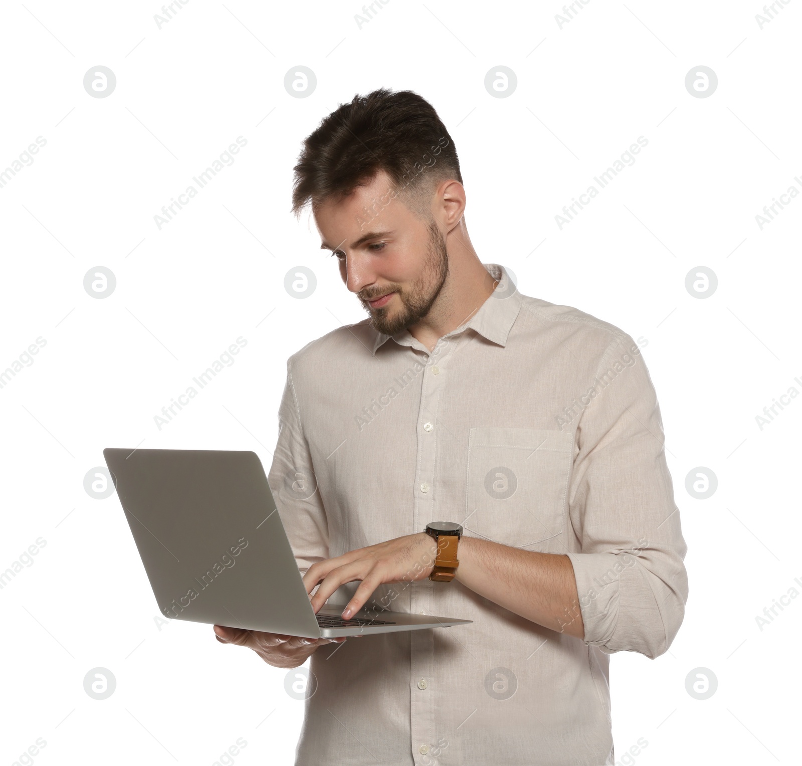 Photo of Handsome man working with laptop on white background