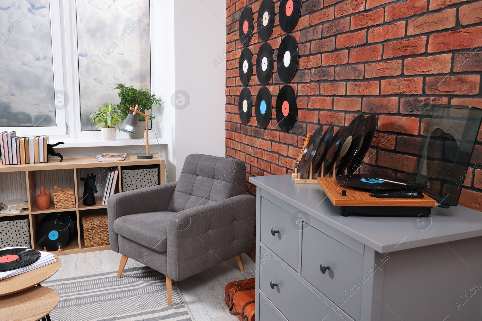 Photo of Living room decorated with vinyl records. Interior design